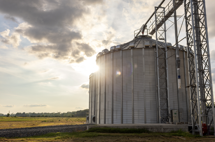 A view of a farmland investment, which includes crop silos.